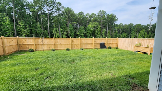 back of property featuring a yard, cooling unit, and a patio