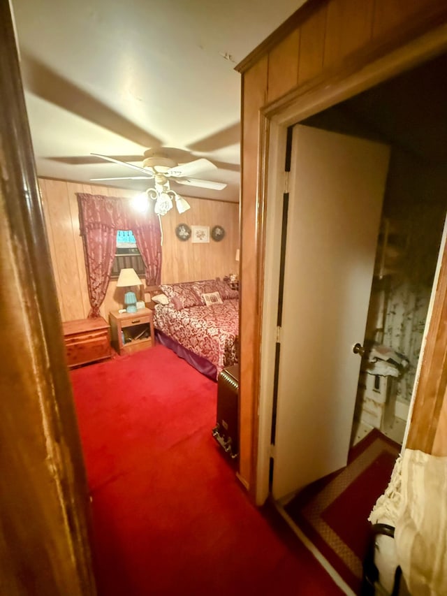 1124 Davidson Ave, Charleston, SC 29407 - carpeted bedroom with wood walls and ceiling fan