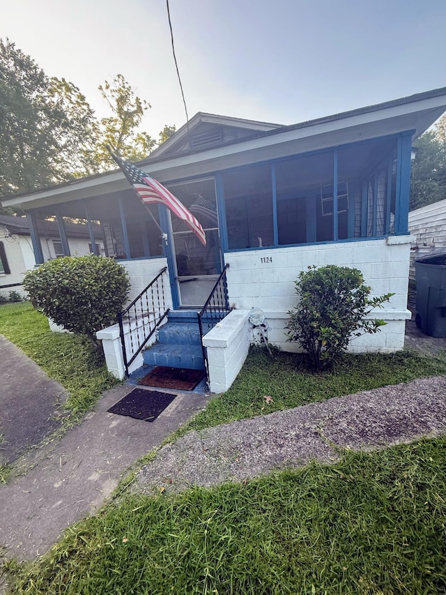 1124 Davidson Ave, Charleston, SC 29407 - view of front of house with a sunroom and entry steps