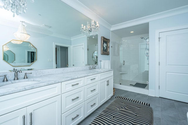 bathroom with tile patterned floors, vanity, an enclosed shower, and ornamental molding