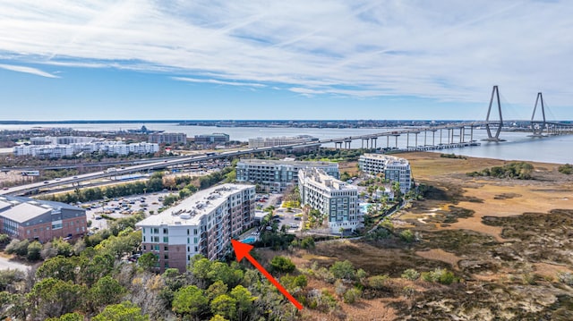 birds eye view of property featuring a water view