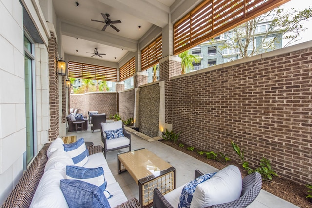 view of patio / terrace featuring an outdoor living space and ceiling fan