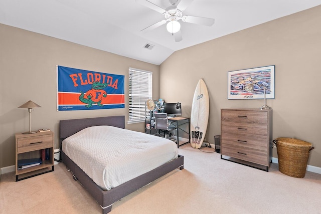 bedroom featuring ceiling fan, light colored carpet, and lofted ceiling