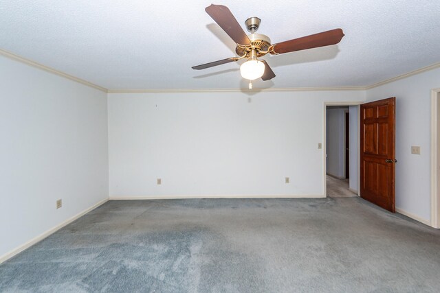 unfurnished room with a textured ceiling, carpet flooring, ceiling fan, and crown molding