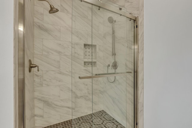 full bathroom featuring a stall shower