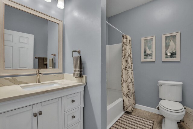 full bathroom featuring vanity, toilet, shower / tub combo with curtain, and tile patterned flooring