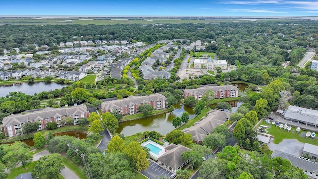 bird's eye view featuring a residential view and a water view