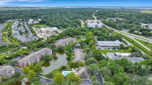 birds eye view of property featuring a residential view and a water view