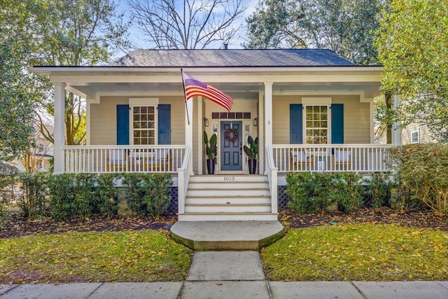 bungalow-style home with a porch