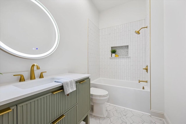 full bathroom with tiled shower / bath, vanity, and toilet