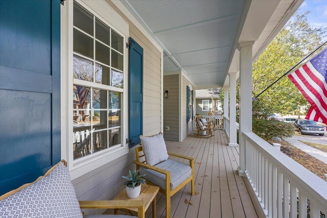 wooden deck featuring covered porch