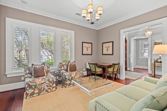 14 Royal Beach Dr, Kiawah Island, SC 29455 - living area featuring healthy amount of natural light, baseboards, a chandelier, wood finished floors, and crown molding