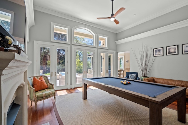 14 Royal Beach Dr, Kiawah Island, SC 29455 - recreation room featuring french doors, billiards, a fireplace, wood finished floors, and ornamental molding