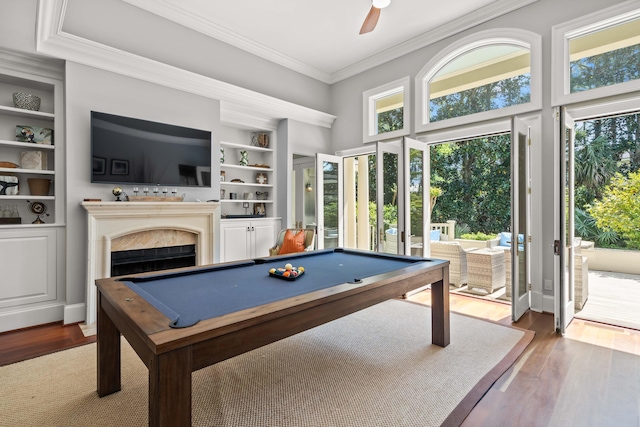 14 Royal Beach Dr, Kiawah Island, SC 29455 - playroom with plenty of natural light, billiards, crown molding, built in features, and wood finished floors