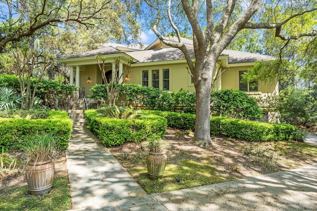 14 Royal Beach Dr, Kiawah Island, SC 29455 - view of front of home with stucco siding and roof with shingles