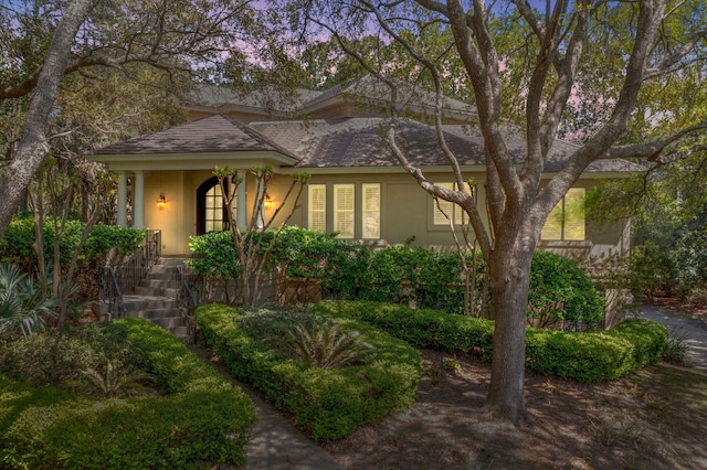 14 Royal Beach Dr, Kiawah Island, SC 29455 - view of front of home featuring stucco siding and roof with shingles