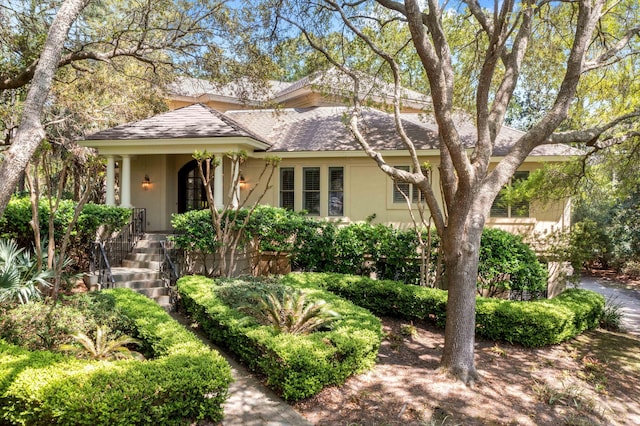 14 Royal Beach Dr, Kiawah Island, SC 29455 - view of front of property with stucco siding and a shingled roof