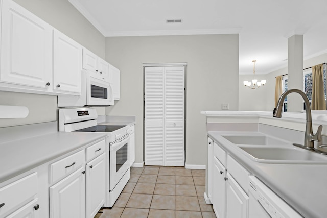 kitchen with white cabinetry, white appliances, light tile patterned flooring, hanging light fixtures, and sink