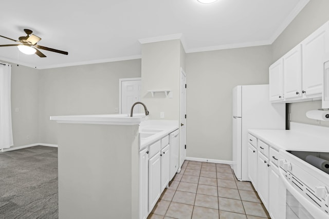 kitchen with white cabinets, kitchen peninsula, sink, and ornamental molding