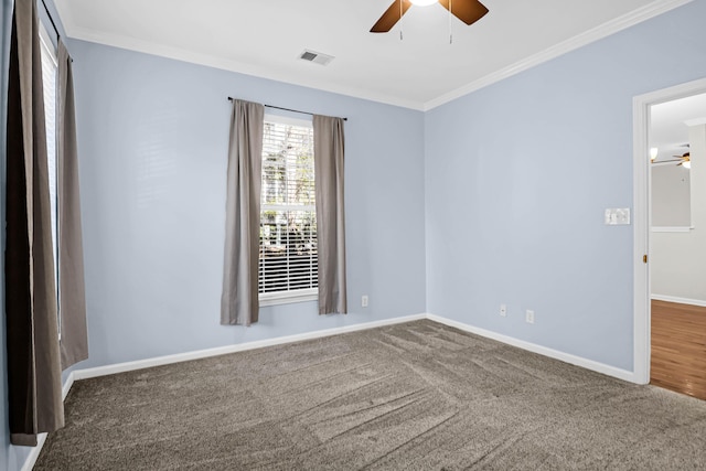 unfurnished room with carpet floors, ceiling fan, and ornamental molding