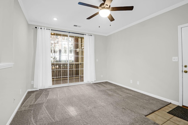 unfurnished room with ceiling fan and ornamental molding