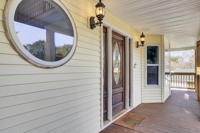 doorway to property featuring a porch