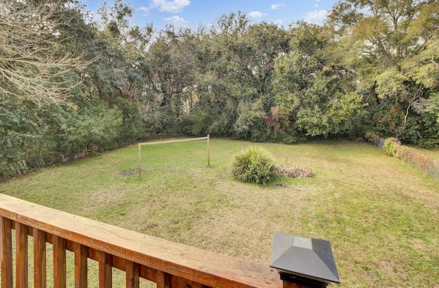 view of yard featuring a wooded view