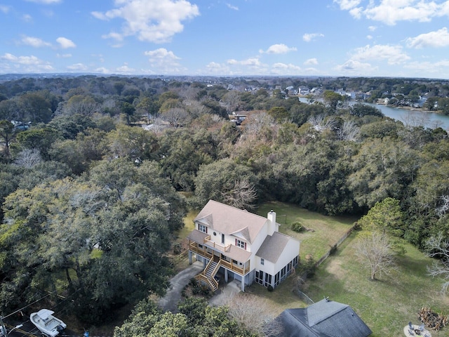 bird's eye view featuring a forest view