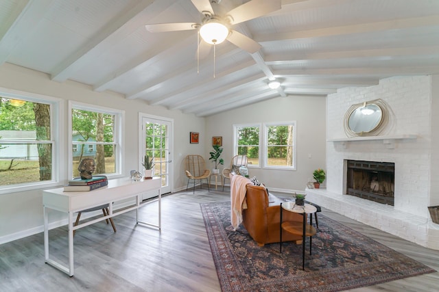 106 Kent Cir, Ladson, SC 29456 - living area featuring a brick fireplace, wood finished floors, baseboards, ceiling fan, and lofted ceiling with beams