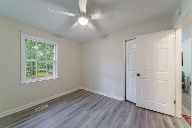 106 Kent Cir, Ladson, SC 29456 - unfurnished bedroom with baseboards, visible vents, wood finished floors, and a closet