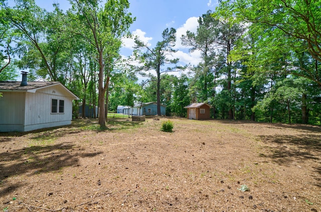 106 Kent Cir, Ladson, SC 29456 - view of yard featuring an outbuilding and a shed