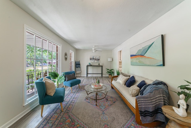 106 Kent Cir, Ladson, SC 29456 - living room with baseboards, wood finished floors, and a healthy amount of sunlight