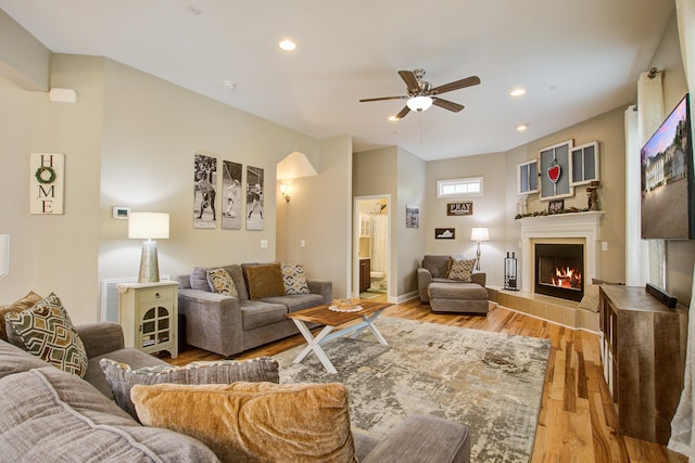 1129 Plantation Overlook Dr, Moncks Corner, SC 29461 - living area featuring ceiling fan, a glass covered fireplace, light wood-type flooring, and recessed lighting