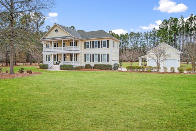 1129 Plantation Overlook Dr, Moncks Corner, SC 29461 - neoclassical / greek revival house featuring a balcony, a porch, a front lawn, and a detached garage