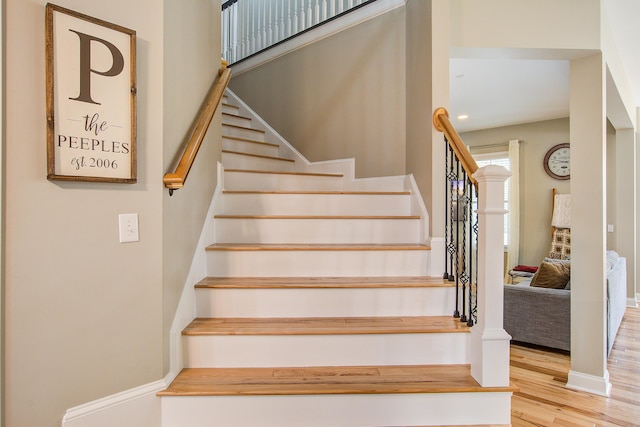 1129 Plantation Overlook Dr, Moncks Corner, SC 29461 - staircase with wood finished floors and recessed lighting
