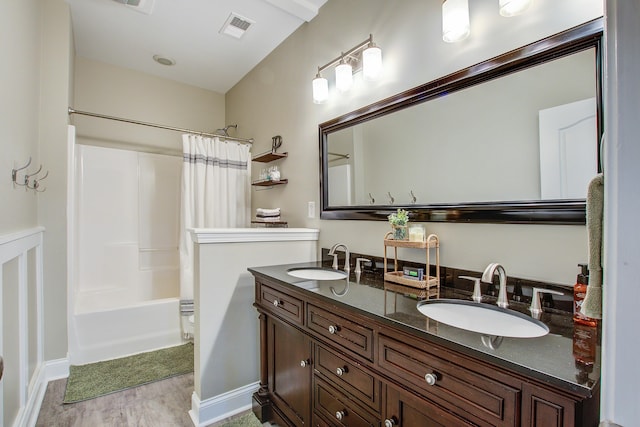 1129 Plantation Overlook Dr, Moncks Corner, SC 29461 - full bath featuring double vanity, wood finished floors, and shower / tub combo with curtain