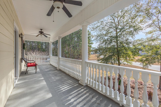 exterior space with ceiling fan and a porch