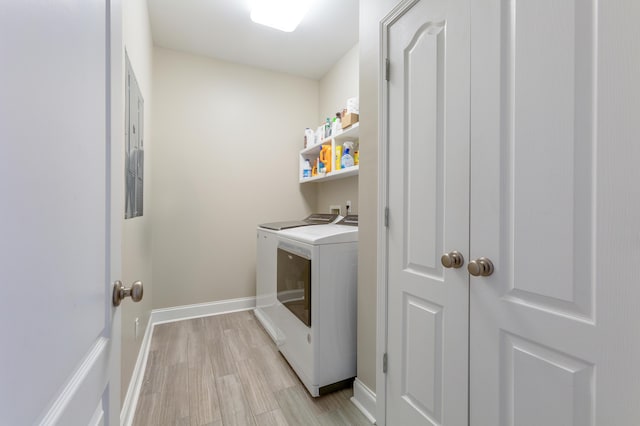 washroom featuring light hardwood / wood-style floors and independent washer and dryer