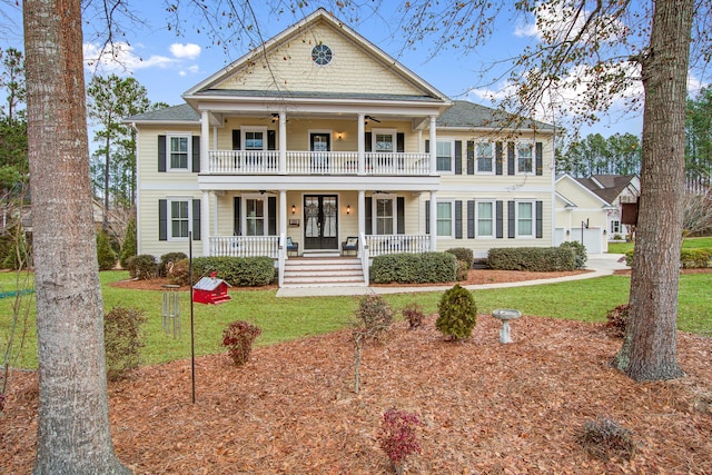 1129 Plantation Overlook Dr, Moncks Corner, SC 29461 - neoclassical home with a ceiling fan, a porch, and a front yard