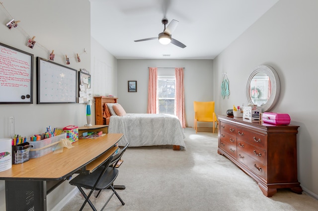 bedroom with light carpet and ceiling fan