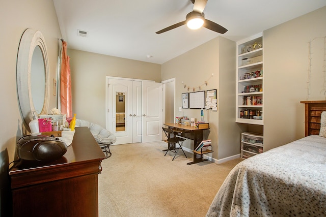 bedroom with light carpet and ceiling fan