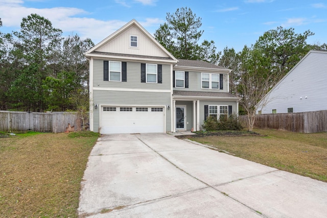 front of property with a garage and a front yard