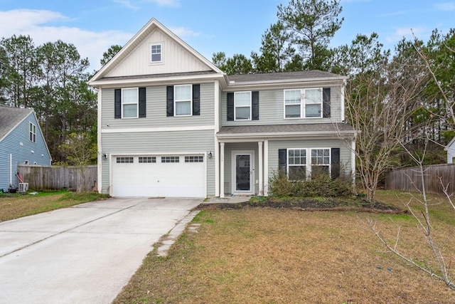 view of front facade featuring a garage and a front yard