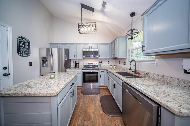 229 Lindy Creek Rd, Goose Creek, SC 29445 - kitchen with stainless steel appliances, a kitchen island, dark wood-style floors, hanging light fixtures, and gray cabinets