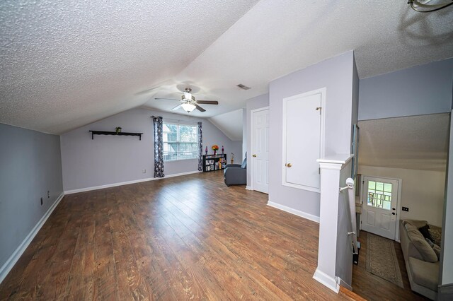 229 Lindy Creek Rd, Goose Creek, SC 29445 - additional living space with wood-type flooring, a ceiling fan, vaulted ceiling, and a textured ceiling