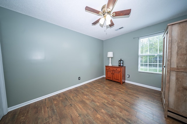 229 Lindy Creek Rd, Goose Creek, SC 29445 - spare room featuring dark wood finished floors and a ceiling fan