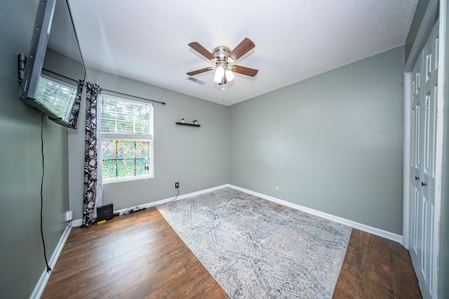 229 Lindy Creek Rd, Goose Creek, SC 29445 - unfurnished room featuring ceiling fan, hardwood / wood-style floors, and a textured ceiling