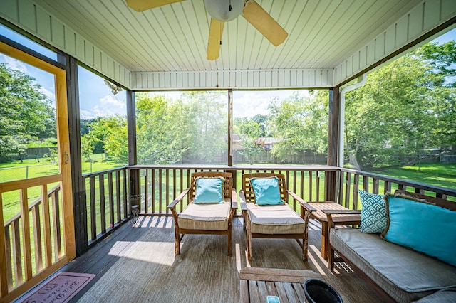 229 Lindy Creek Rd, Goose Creek, SC 29445 - sunroom with ceiling fan, an outdoor hangout area, and view of scattered trees