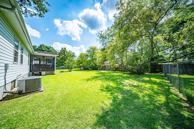 229 Lindy Creek Rd, Goose Creek, SC 29445 - fenced backyard with a sunroom