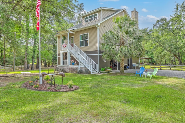 100 Canal Rd, Saint George, SC 29477 - back of house featuring a chimney and stairs